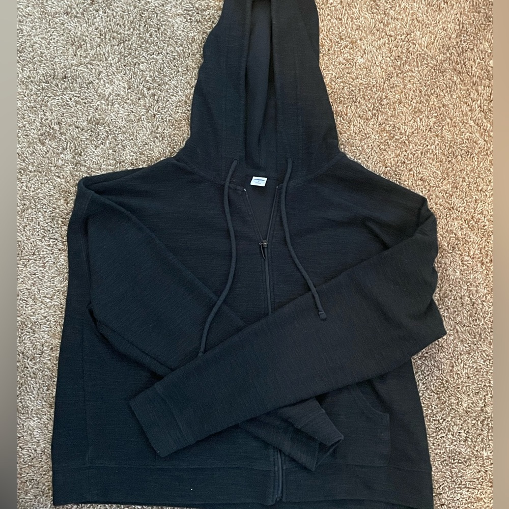 This is a black old navy hoodie perfect for the finishing touch in your outfit.